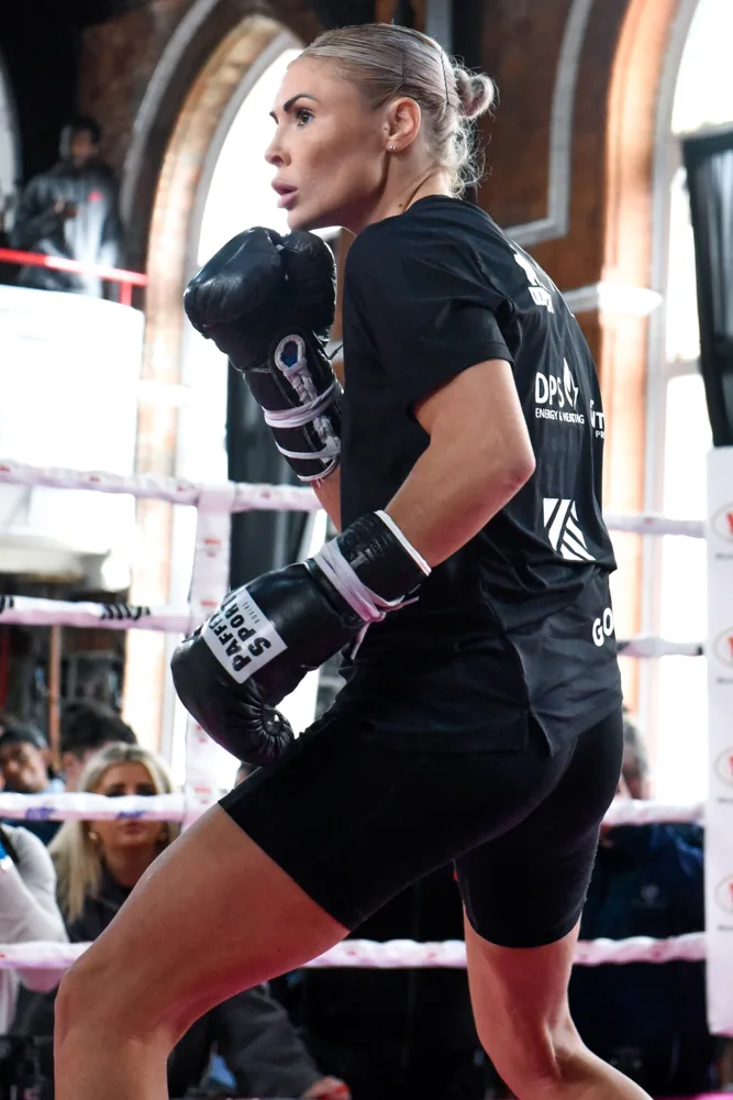 Boxer training in the ring in natural window light