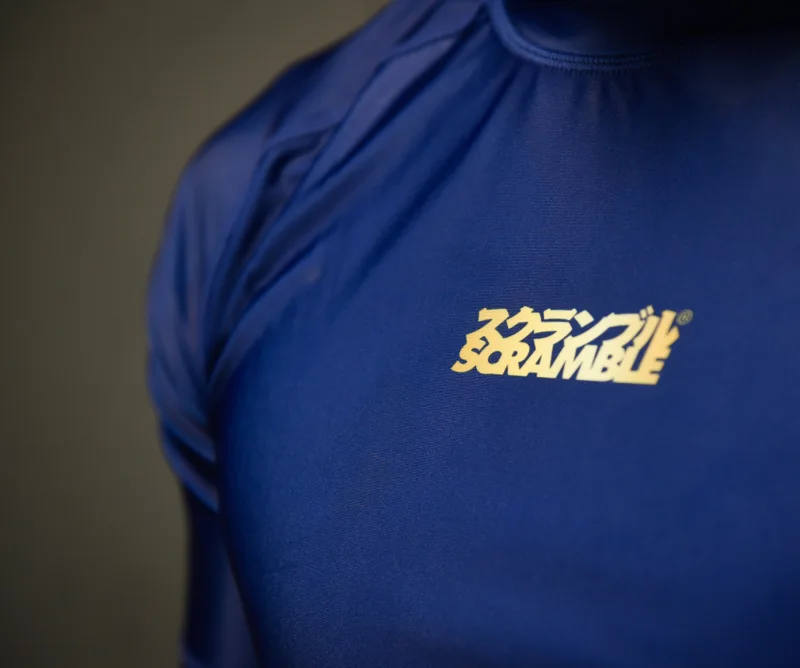 Close-up of a blue Scramble training shirt
