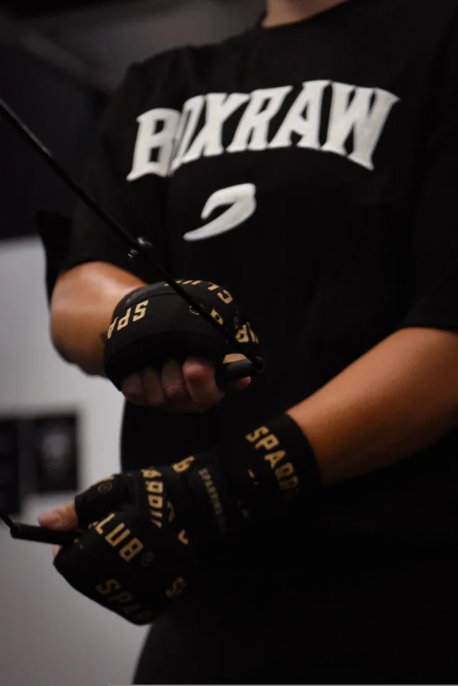 Boxraw clothing and hand wraps during a training session