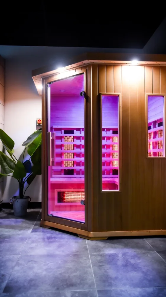 Gym sauna illuminated with purple lighting